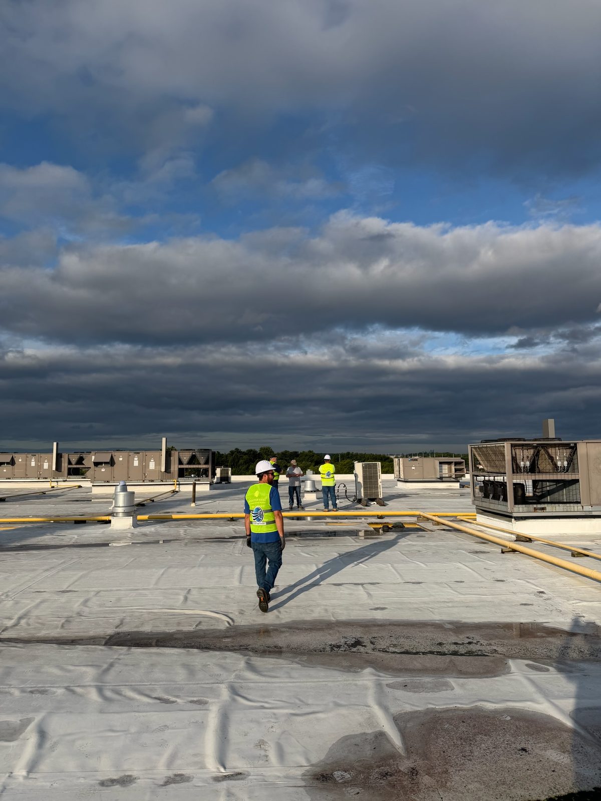 Commercial rooftop with multiple rooftop units under a Rooftop HVAC maintenance program