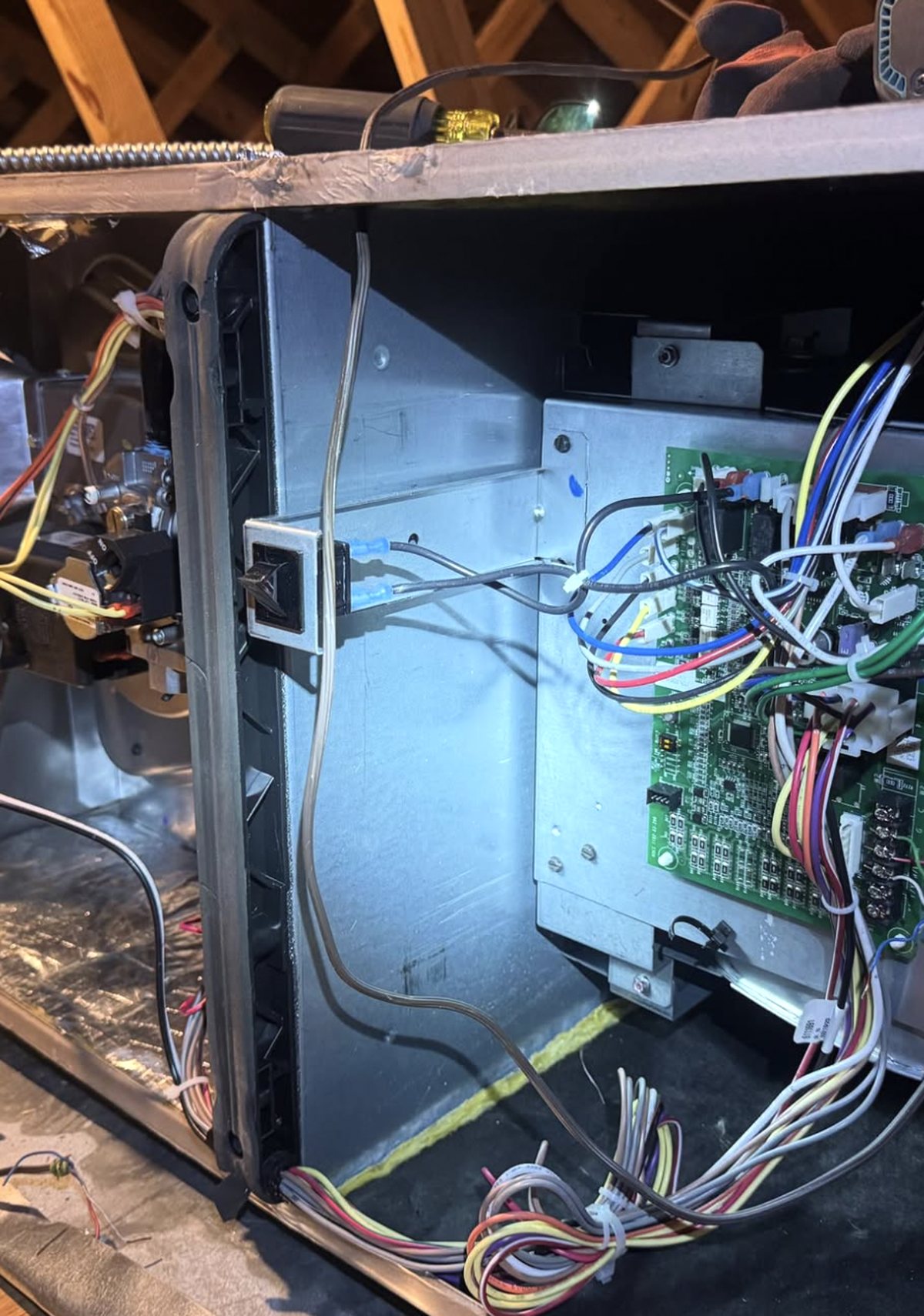 Control board and low-voltage wiring inside a newly installed furnace